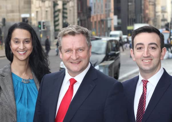 Cushman & Wakefield's Stuart Dorward, centre, with new partners Maria FranckÃ© and Tony Rosenthal. Picture: Contributed