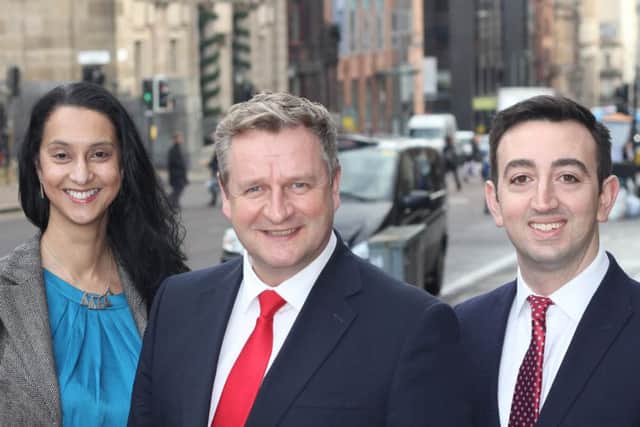 Cushman & Wakefield's Stuart Dorward, centre, with new partners Maria FranckÃ© and Tony Rosenthal. Picture: Contributed