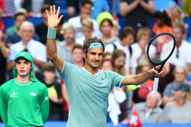 Roger Federer celebrates his win over Dan Evans in the Hopman Cup in Perth. Picture: Paul Kane/Getty Images