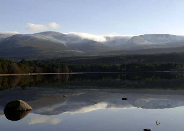 The Cairngorm mountains reflected in Loch Morlich near Aviemore. Picture Ian Rutherford.