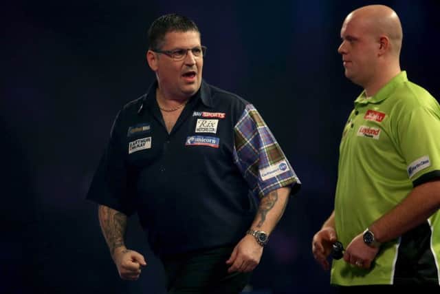 Gary Anderson took an early lead against Michael van Gerwen, but the Dutchman proved to be in a league of his own. Picture: Steven Paston/PA