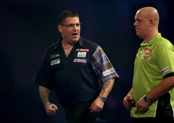 Gary Anderson took an early lead against Michael van Gerwen, but the Dutchman proved to be in a league of his own. Picture:  Steven Paston/PA