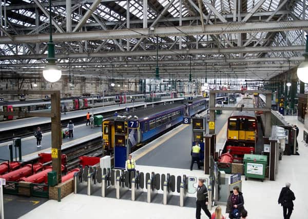 The trade-union backed group have organised demonstrations at more than 100 train stations throughout Tuesday, including in London, Birmingham, Manchester and Glasgow. Picture: John Devlin