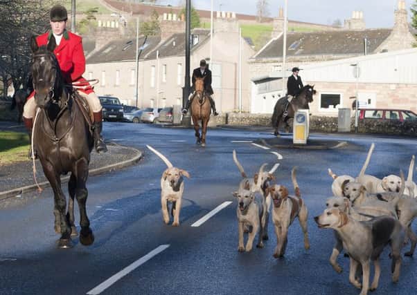 A hunt leaves Duns in the Scottish Borders.