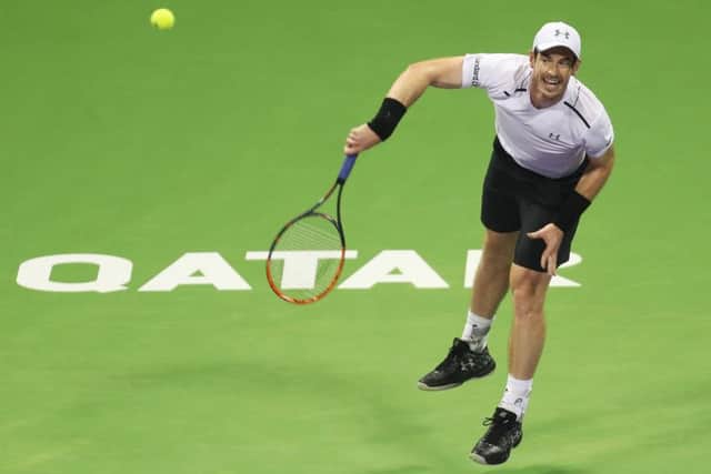 Andy Murray serves during his win over France's Jeremy Chardy at the Qatar Open. Picture: Karim Jafaar/AFP/Getty Images