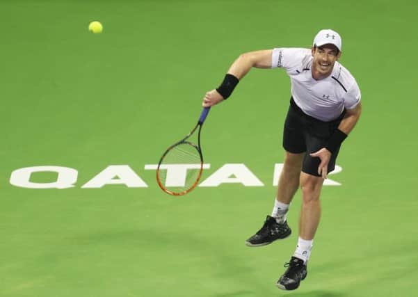 Andy Murray serves during his win over France's Jeremy Chardy at the  Qatar Open. Picture: Karim Jafaar/AFP/Getty Images