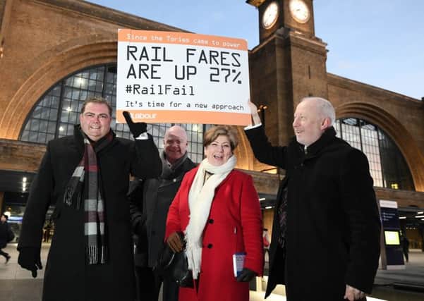 TSSA general secretary Manuel Cortes with shadow foreign secretary Emily Thornberry and shadow transport minister Andy McDonald at King's Cross Station in London today, who said season tickets had gone up by an average of 27 per cent since 2010. Picture: Carl Court/Getty Images