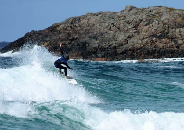 Scottish surfer Andrew Robertson, working on his top turns at Balevullin, Isle of Tiree