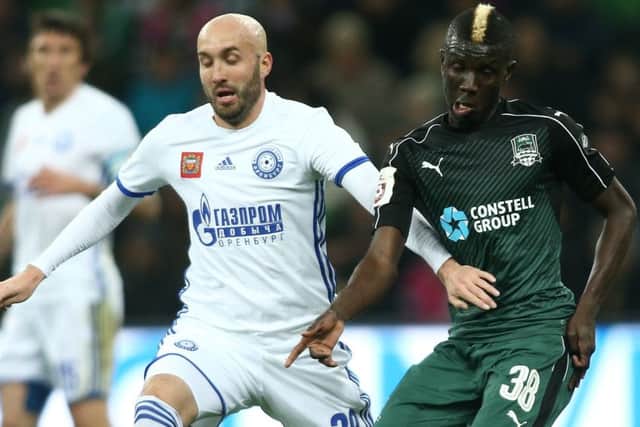 Kuassi Eboue, right, of FC Krasnodar could join Celtic in Dubai after the clubs agreed a transfer fee. Picture: Getty.