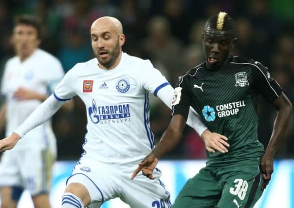 Kuassi Eboue, right, of FC Krasnodar could join Celtic in Dubai after the clubs agreed a transfer fee. Picture: Getty.