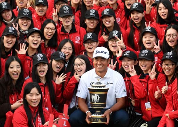 Hideki Matsuyama  poses with the trophy after the final round of the 2016 World Golf Championships-HSBC Champions tournament in Shanghai. Picture: Johannes Eisele/AFP/Getty Images