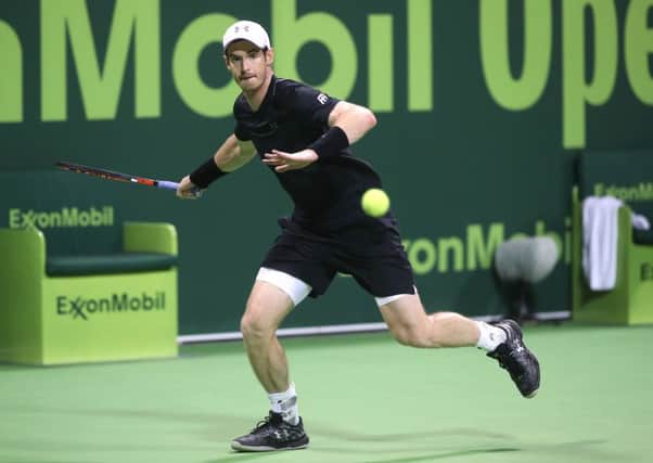 Andy Murray returns the ball to Austria's Gerald Melzer during the second round of the ATP Qatar Open in Doha. Picture: Karim Jaafar/AFP/Getty Images