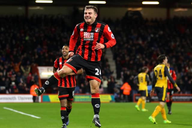 Ryan Fraser celebrates after scoring Bournemouth's third goal against Arsenal. Picture: Warren Little/Getty Images