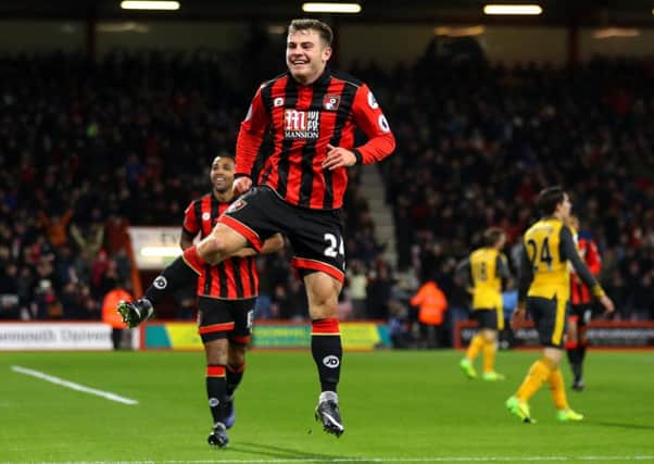 Ryan Fraser celebrates after scoring Bournemouth's  third goal against Arsenal. Picture:  Warren Little/Getty Images