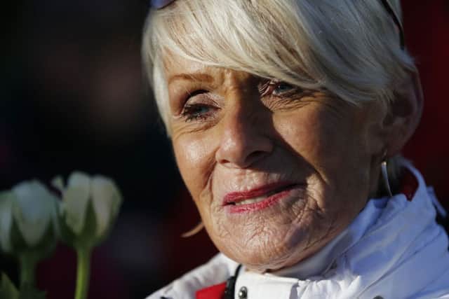 Gina Campbell, the daughter of world land and water speed record holder Donald Campbell, visits a memorial at Lake Coniston Picture: Owen Humphreys/PA Wire