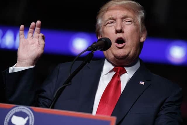 President-elect Donald Trump has business interest in Scotland (AP Photo/Evan Vucci, File)