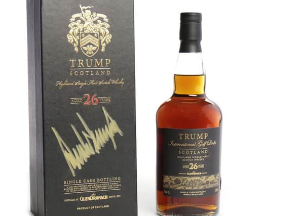 A bottle of limited edition 26-year-old GlenDronach single malt whisky signed by Donald Trump. Picture: SWNS