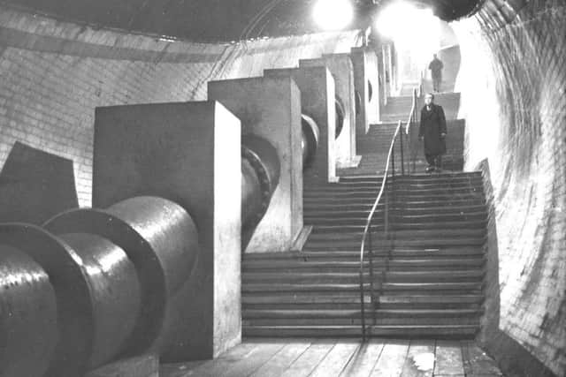 A water main runs alongside the pedestrian tunnel in circa 1960. The last tunnel closed to the public in April 1980. Picture: SWNS
