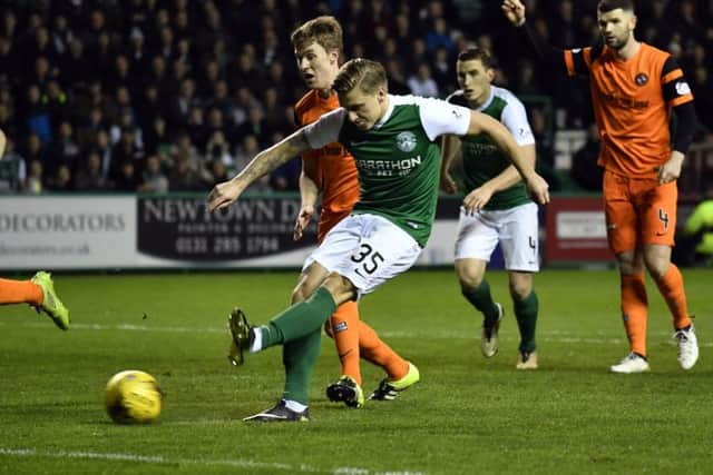 Jason Cummings opens the scoring for Hibs against Dundee United at Easter Road. Picture: Rob Casey/SNS