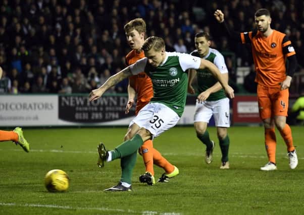 Jason Cummings opens the scoring for Hibs against Dundee United at Easter Road. Picture: Rob Casey/SNS