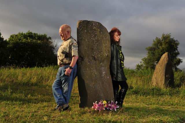 Jack Forbes and his daughter Linda at the stone circle. His mother's ashes were scattered around the centre stone.  Picture: Robert Perry