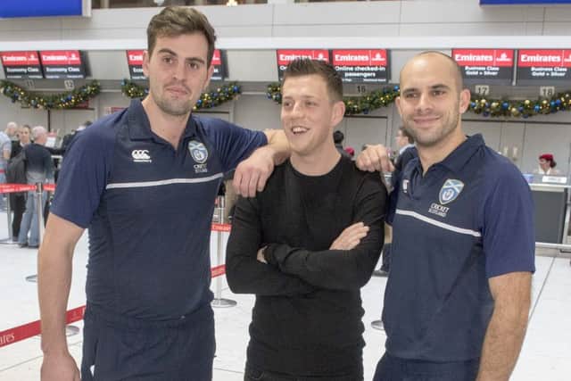 Scotlands Calum MacLeod, left, and Kyle Coetzer with Celtic midfielder Callum McGregor, centre, whose team were also flying to the Gulf on Friday. Photograph: Donald MacLeod