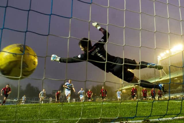 Mortons Michael Tidser scores his sides second goal from the penalty spot.  Picture: Sammy Turner/SNS