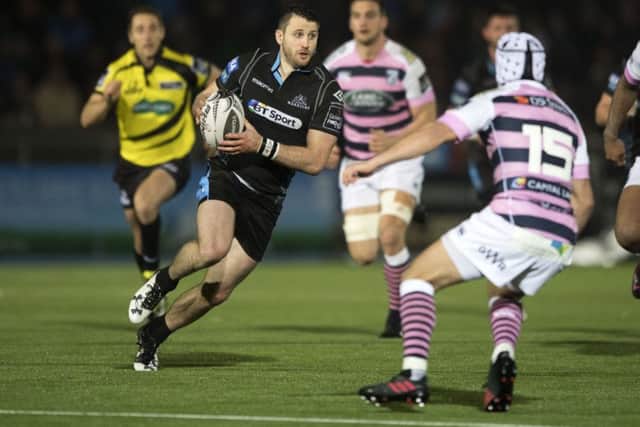 Glasgow Warriors' Tommy Seymour drives towards Matthew Morgan of Cardiff. Picture: Gary Hutchison/SNS/SRU