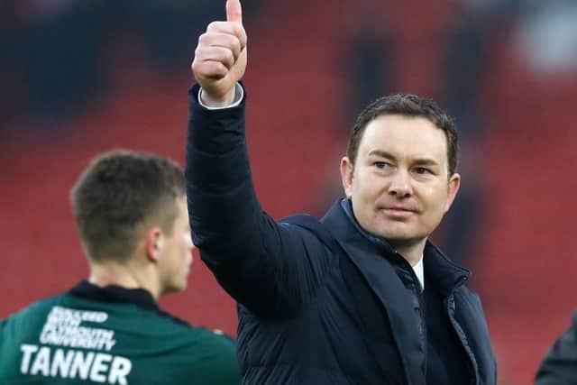 Plymouth Argyle manager Derek Adams gives visiting fans a thumbs up after the 0-0 draw at Anfield. Picture: PA/
