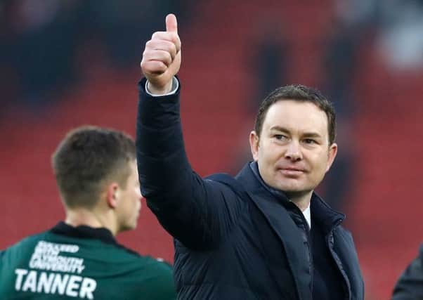 Plymouth Argyle manager Derek Adams gives visiting fans a thumbs up after the 0-0 draw at Anfield. Picture: PA/