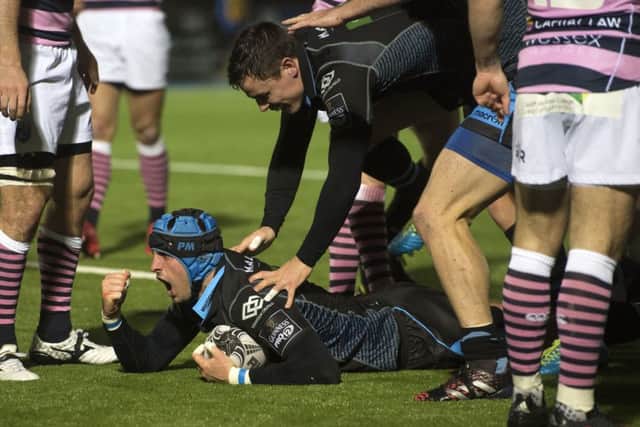 Glasgow Warriors' Peter Murchie clenches his fist after touching down in the Pro12 win over Cardiff Blues. Picture: Gary Hutchison/SNS/SRU