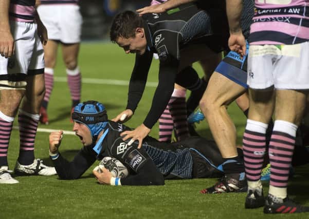 Glasgow Warriors' Peter Murchie clenches his fist after touching down in the Pro12 win over Cardiff Blues. Picture: Gary Hutchison/SNS/SRU