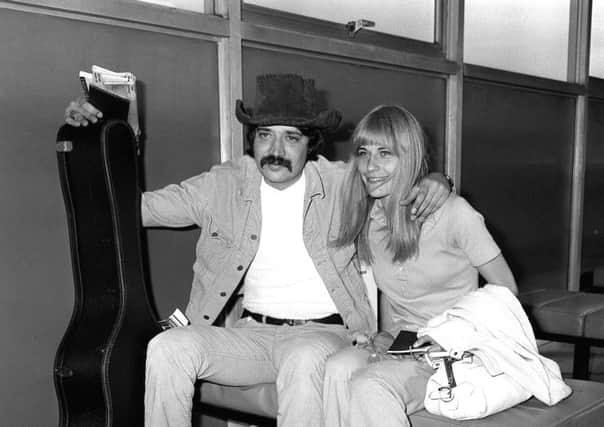 British singer-songwriter Peter Sarstedt with Anita Atke at Heathrow Airport in London. Picture: PA Wire