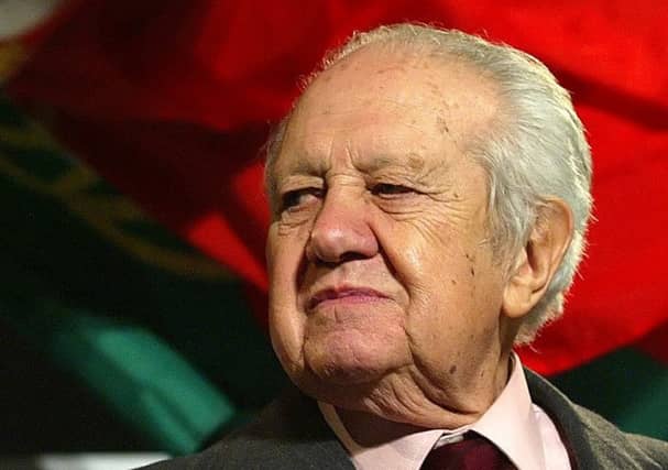 FILE - In this Jan. 20, 2006 file photo, former Portuguese president and prime minister Mario Soares and his wife Maria Barroso stand together after an election campaign rally in Porto, northern Portugal. Portugal's Socialist Party, which Soares once led, said he died Saturday, Jan. 7 2017, at the age of 92. Soares had been hospitalized seen Dec. 13 2016.(AP Photo/Paulo Duarte, file)