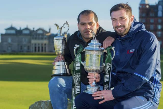 Former Hibs players Kevin Harper, left, and Kevin Thomson with the Claret Jug and Scottish Cup in St Andrews. Picture: Bill Murray/SNS