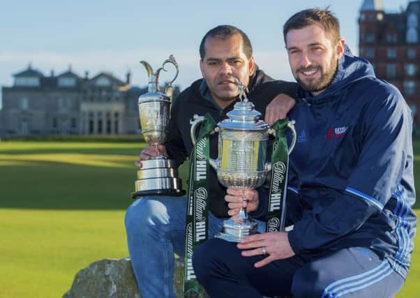 Former Hibs players Kevin Harper, left, and Kevin Thomson with the Claret Jug and Scottish Cup in St Andrews. Picture: Bill Murray/SNS