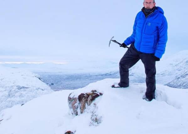 Climber John McSporran on top of Stob Mhic Mhartuin in Glencoe. Picture: SWNS