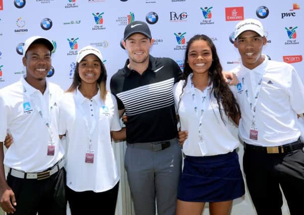 Rory McIlroy poses with players of The Ernie Els and Fancourt Foundation after they had taken part in the Friendship Cup with The Faldo Junior Series Team during the pro-am for the 2017 BMW South African Open Championship. Picture: David Cannon/Getty Images