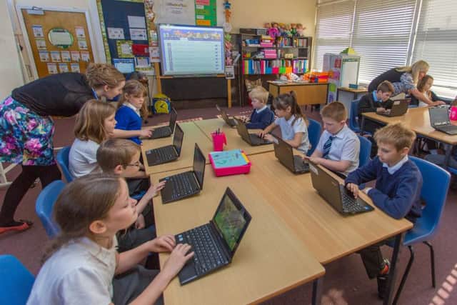 Teachers will be able to access a new online resource aimed at boosting attainment in Scottish schools. Picture: Steven Brown/JP