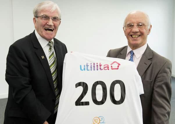 Old Firm legends Bertie Auld, left, and Willie Henderson open the new Utilita call centre in Glasgow and announce the 200 jobs it has created. Former Rangers winger Henderson says Ibrox manager Mark Warburton can't be blamed for failing to catch up with rucher, better-prepared Celtic.