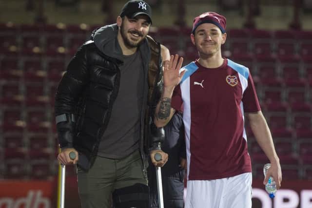 Callum Paterson, left, with Sam Nicholson, who was also injured, at Tynecastle last month.