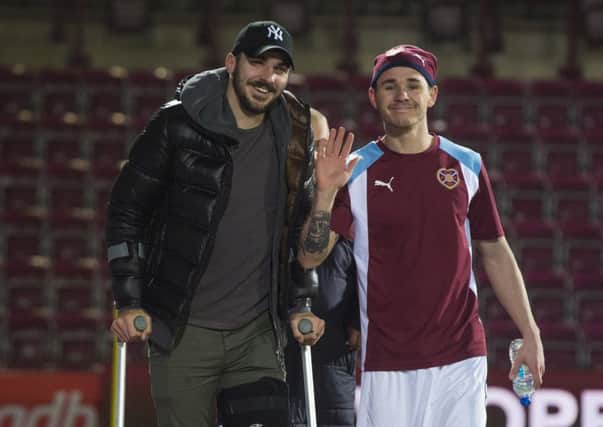Callum Paterson, left, with Sam Nicholson, who was also injured, at Tynecastle last month.
