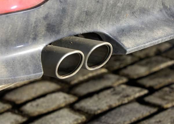 Transport minister Chris Grayling says motorists should think twice before buying a diesel car. (File photo)