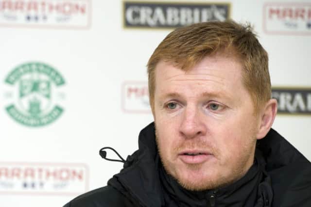 Neil Lennon is wary of the contrast between a packed Easter Road on Friday and the exposed and sparsely-attended stabium at Dumberton. Picture: Paul Devlin/SNS