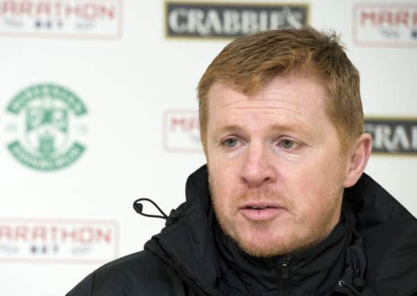 Neil Lennon is wary of the contrast between a packed Easter Road on Friday and the exposed and sparsely-attended stabium at Dumberton. Picture: Paul Devlin/SNS