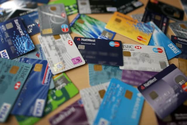 The main weapon to clear credit and store cards is a balance transfer, where you get a new card that repays debts on existing cards at a far lower cost, for a small fee. Picture: Getty