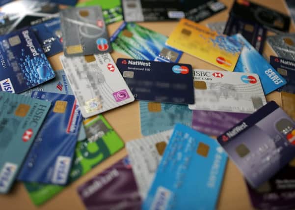 The main weapon to clear credit and store cards is a balance transfer, where you get a new card that repays debts on existing cards at a far lower cost, for a small fee. Picture: Getty