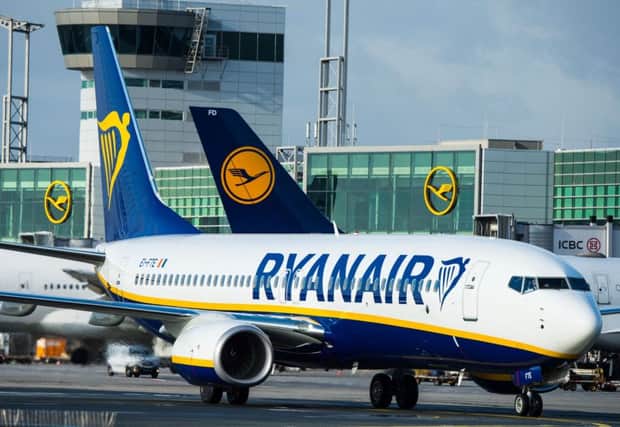 Drunk passengers who cause a flight to be diverted could face a fine of 80,000 pounds. Picture: Andreas Arnold/Getty Images