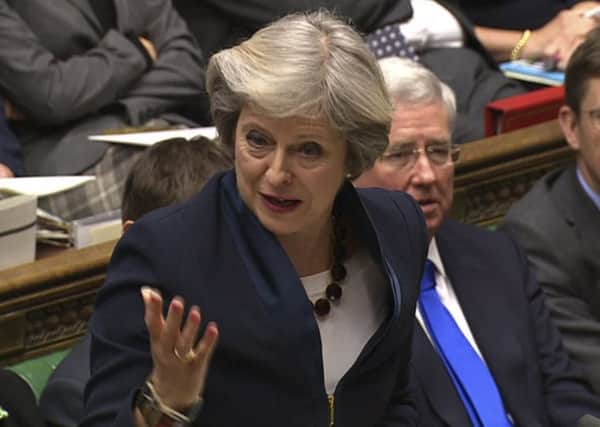 Prime Minister Theresa May answers questions during the weekly Prime Minister Questions session in the House of Commons. Picture; Getty