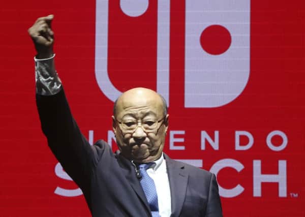 Nintendo president Tatsumi Kimishima after his speech during the presentation of the new Switch console. Picture: Koji Sasahara/AP